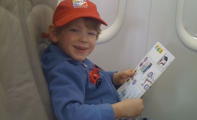 Little kid sitting on plane