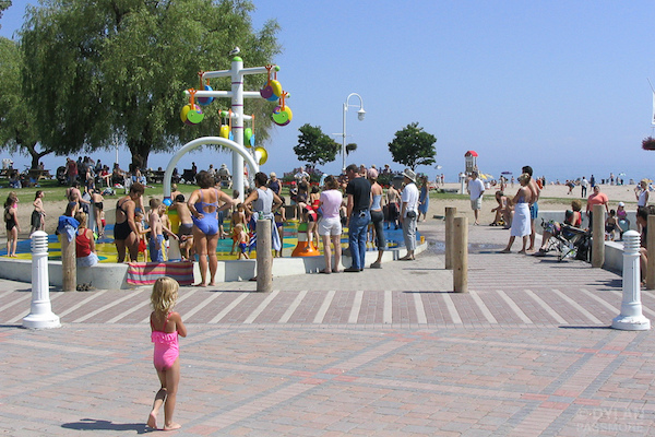 Kids at the splash pad on Cobourg Beach in Ontario