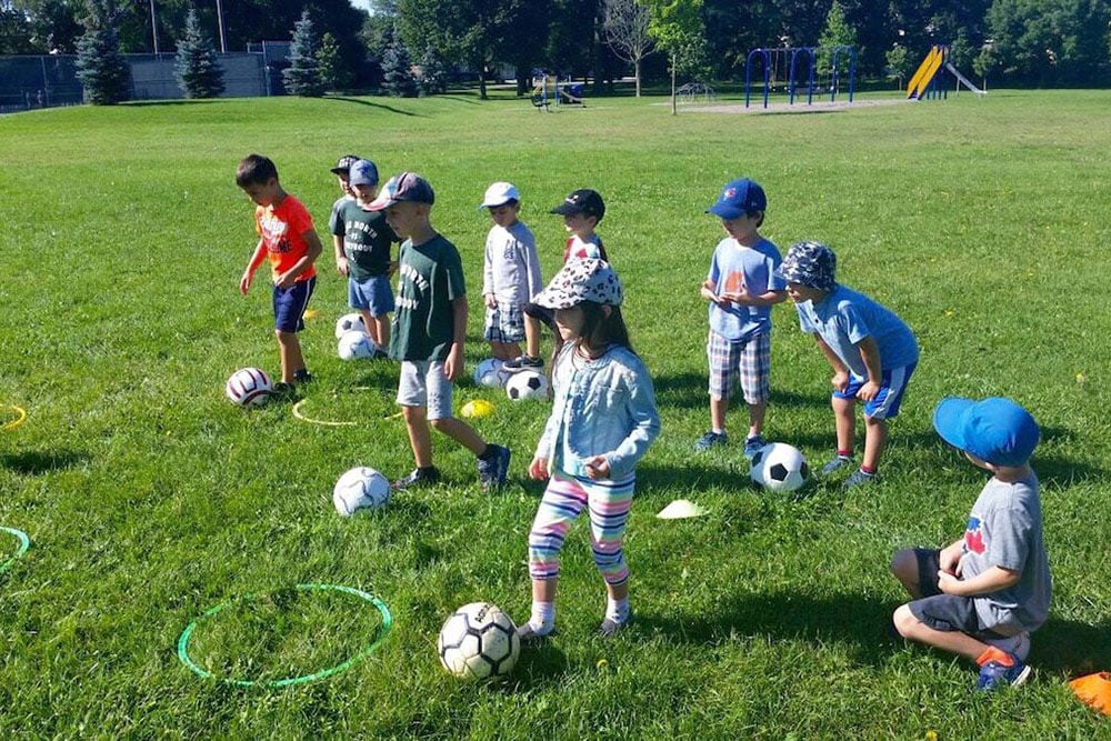 Kids playing soccer at True North Sports Camps