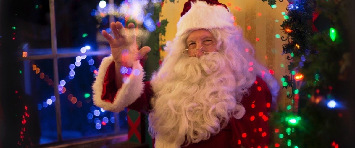 Santa Claus waving at camera