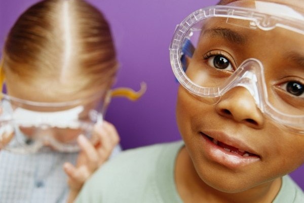 children wearing safety goggles