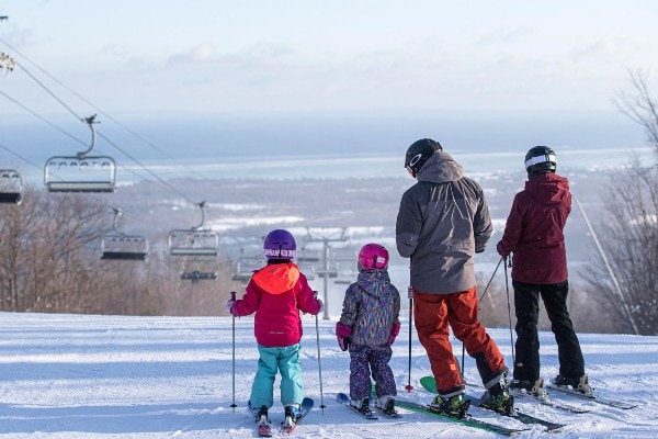 Family skiing at Blue Mountain Resort in Ontario