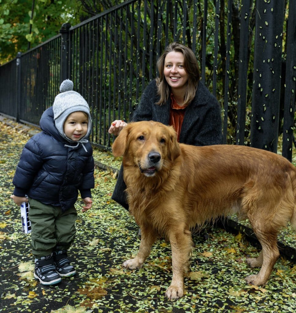 golden retriever with mom and toddler